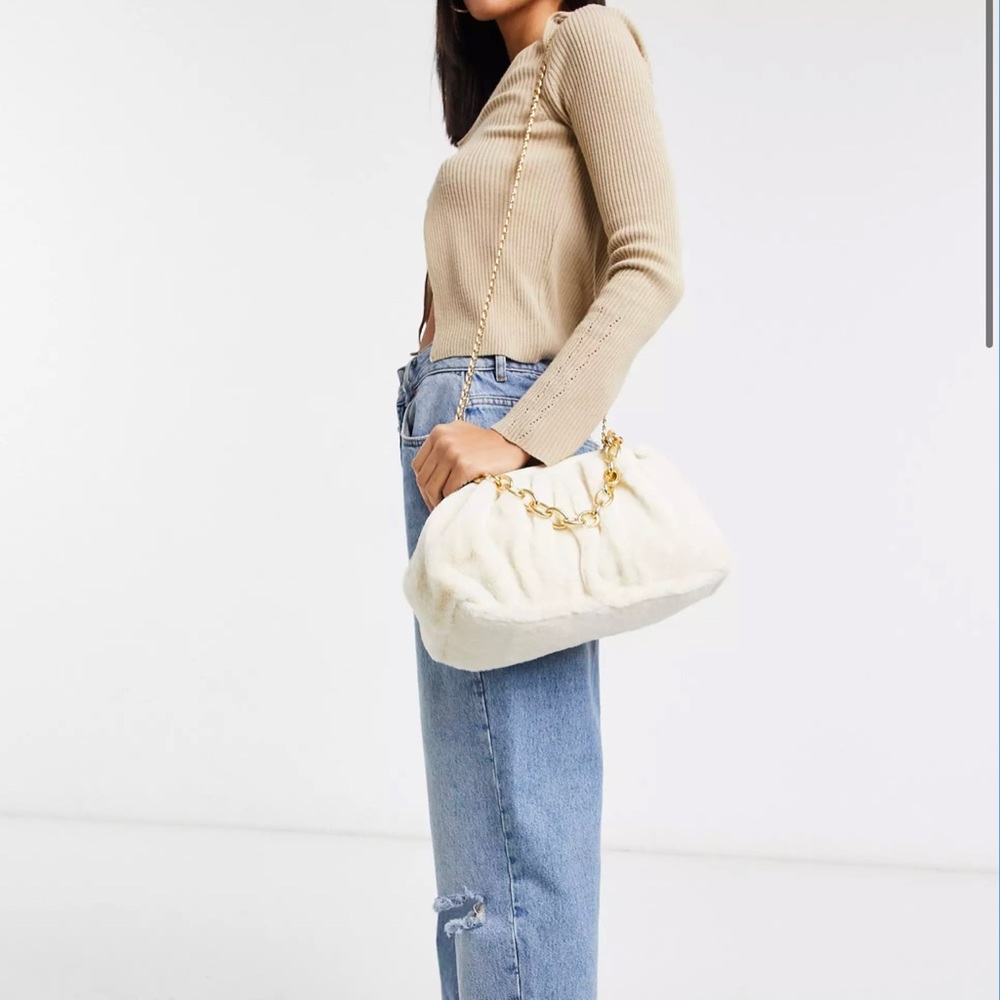 Skinnydip Nova clutch bag with chunky chain in cream faux fur